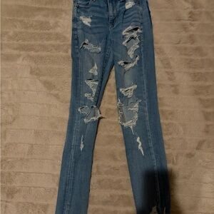 American Eagle Outfitters Ripped Skinny Jeans in Blue